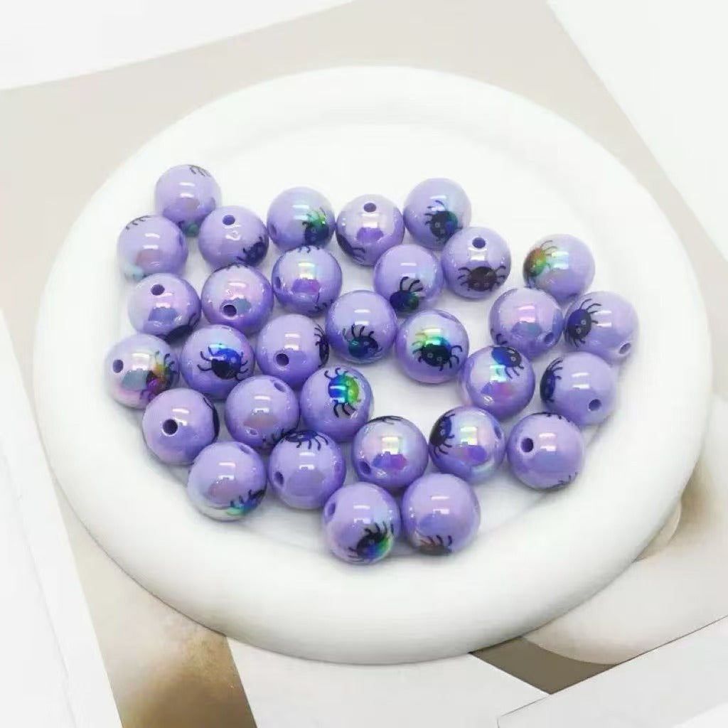 A pack of 100 acrylic Halloween printed UV-coated colored straight-hole beads for DIY beaded pens, phone chains, keychains, and other accessories
